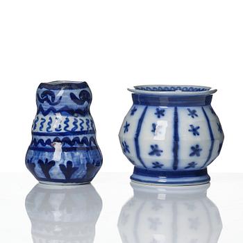 Wilhelm Kåge, a jar with cover, and four vases, creamware and porcelain, Gustavsberg, Sweden, 1917-1920.