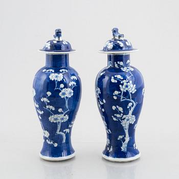 A pair of vases with covers, China, late Qing dynasty.