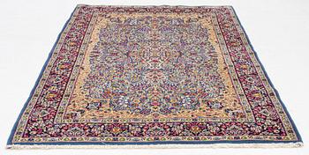 A Kirman rug, c. 249 x 148 cm.