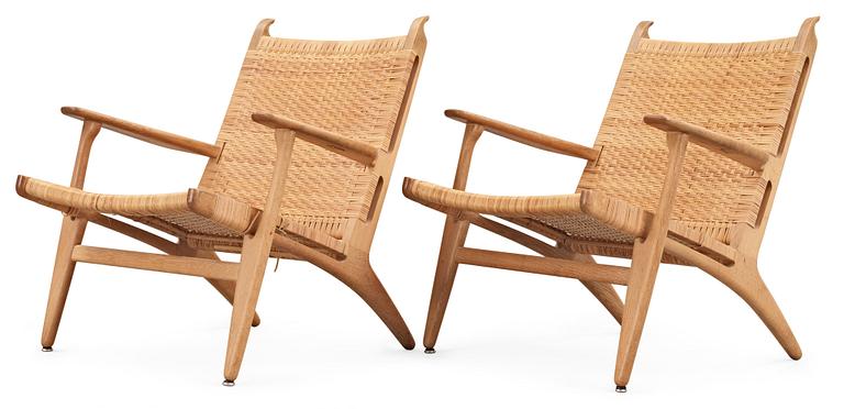 A pair of Hans J Wegner oak and rattan 'CH-27' armchairs, Carl Hansen & Søn, 1950's.