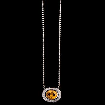 A citrine and brilliant cut diamond pendant, tot. 0.72 cts.