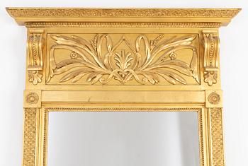 An Empire mirror, first half of the 19th century.