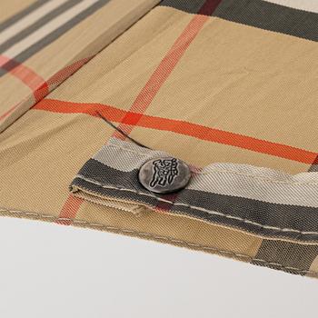 Burberry, an umbrella.