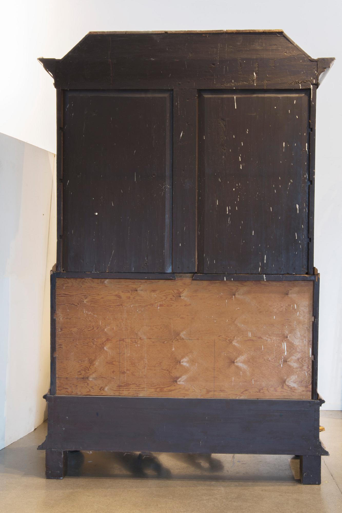 An early 18th century Chinese style cupboard.