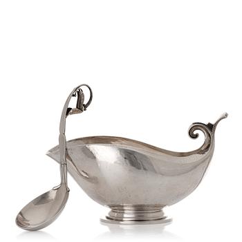 155. Georg Jensen, a sterling silver sauceboat and ladle, Copenhagen 1925-1945, design nr 98 and 141.