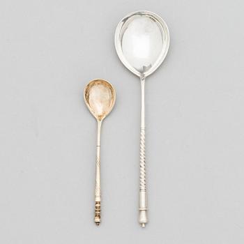 Two Russian spoons in gilt silver and silver, makers' marks of Konstantin Petz 1848, Vasilij M. Ashmarin 1888, Moscow.