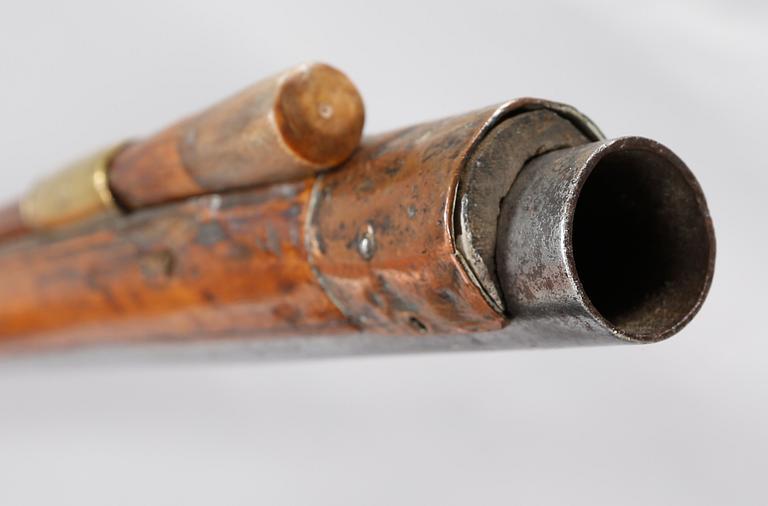 A flintlock rifle, 18th century.