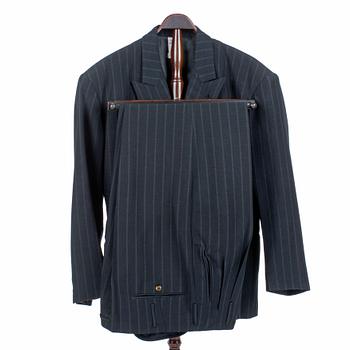 JEAN-PAUL GAULTIER, a black woolblend pinstriped men's jacket and pants. Size 50.