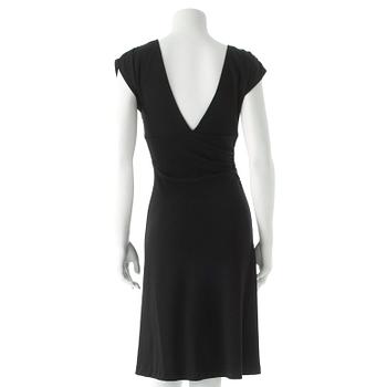 DIANE VON FURSTENBERG, a black wool dress.