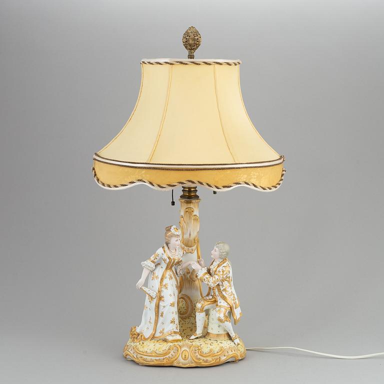 a rococo-style porcelain table lamp from the first half of the 20th century.