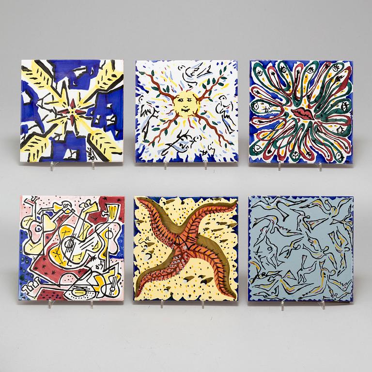 Six Salvador Dalí tiles.