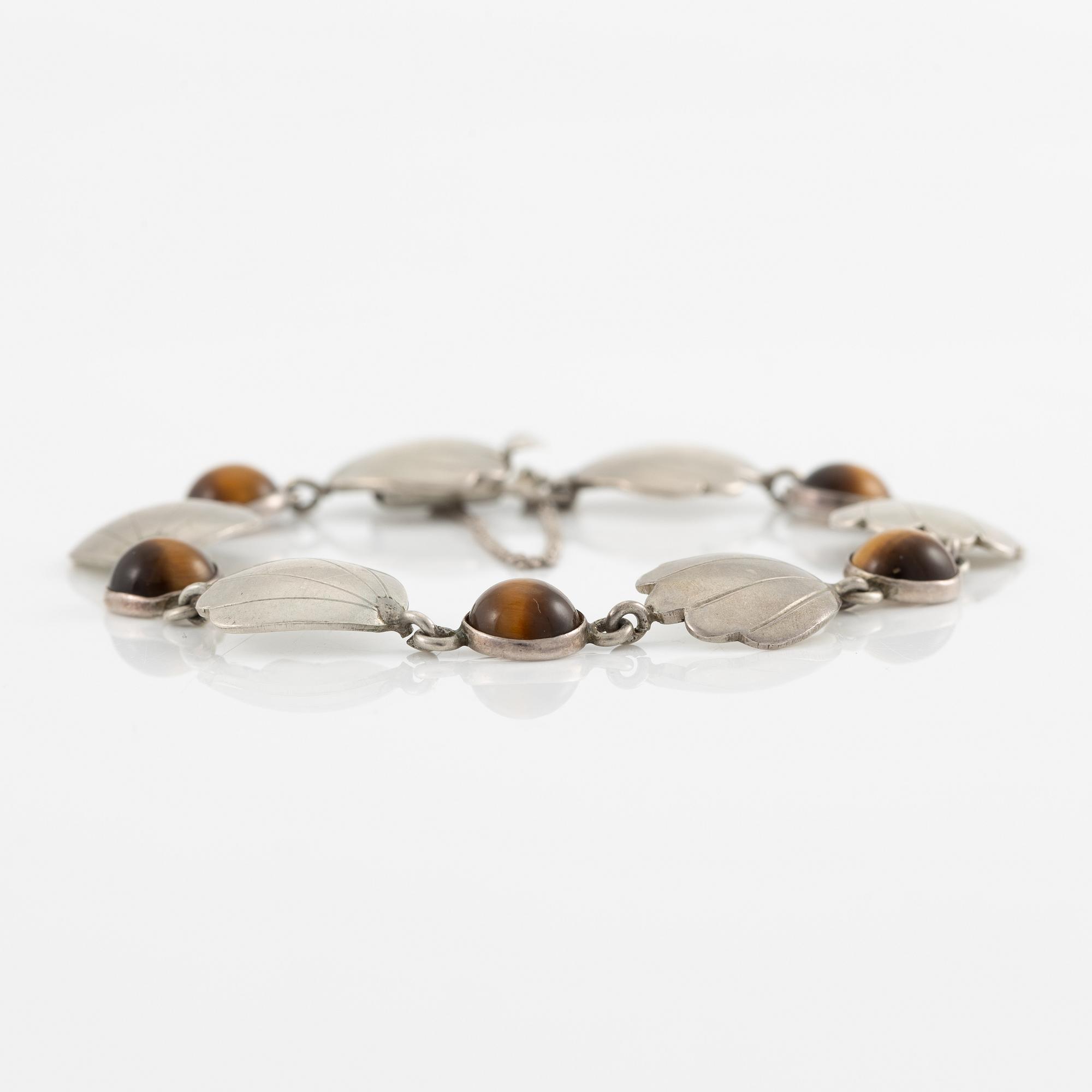 Two bracelets, Victor Janson, silver, one set with tiger's eye.