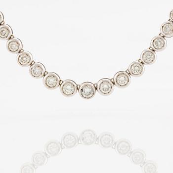 An 18K white gold bracelet set with round brilliant-cut diamonds.