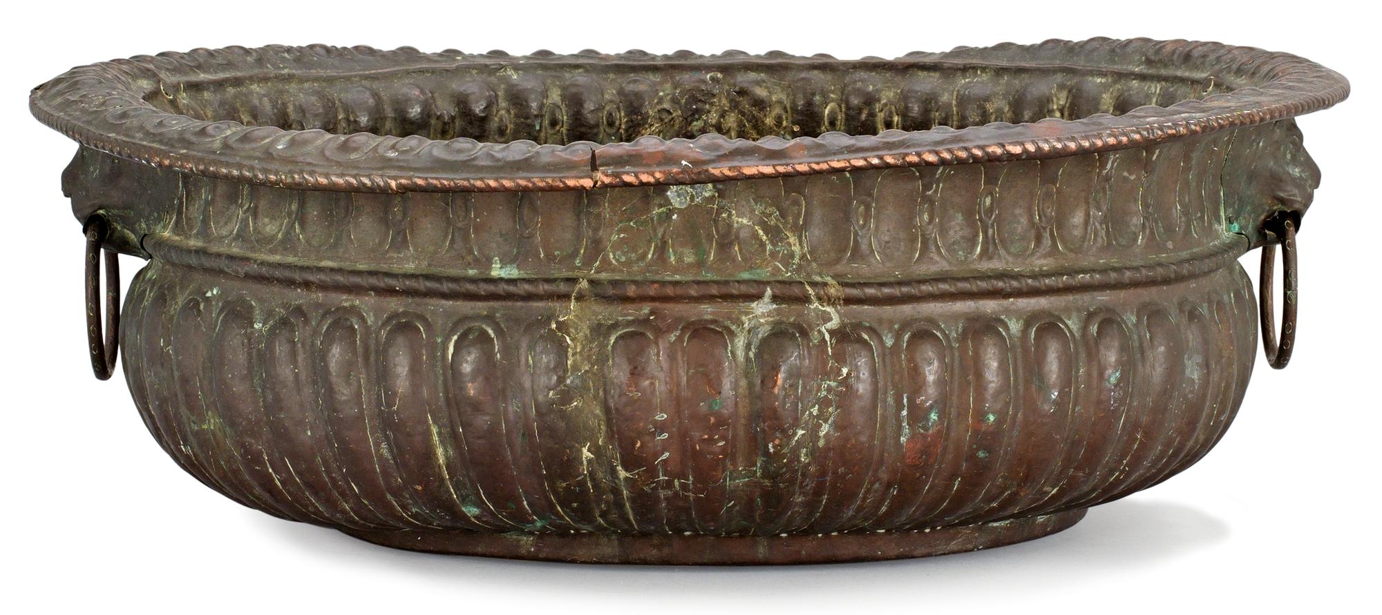 A Baroque copper wine cooler.