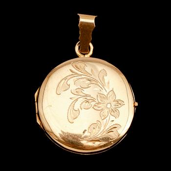 MEDALJONG, 18 k guld. Total vikt ca 9 g.