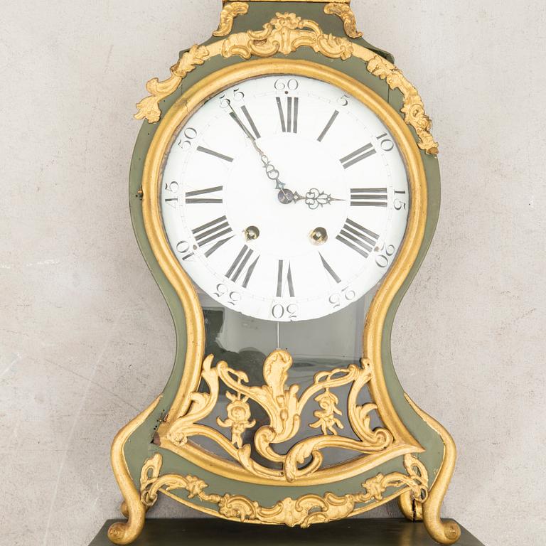 Mantel clock with console, Rococo style, 19th century.