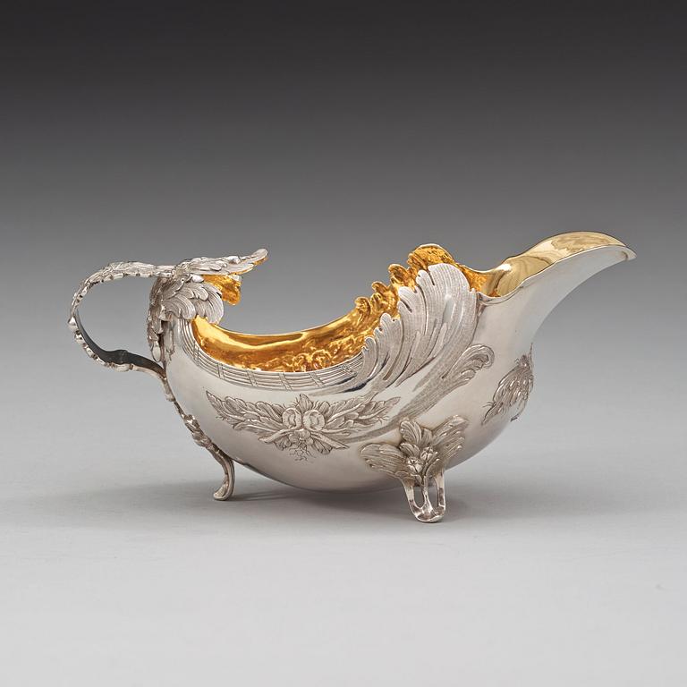 A Swedish 18th century parcel-gilt cream-jug, marks of Fredrik Petersson Ström, Stockholm 1774.