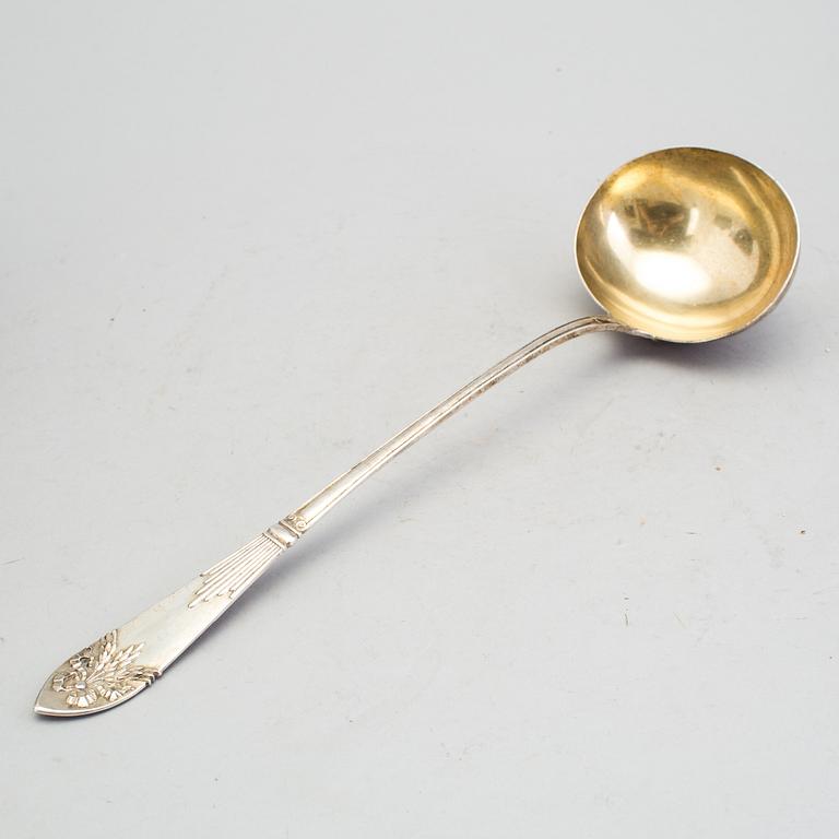 A Swedish early 20th century parcel-gilt soup-ladle, marked CGH, Stockholm 1907.