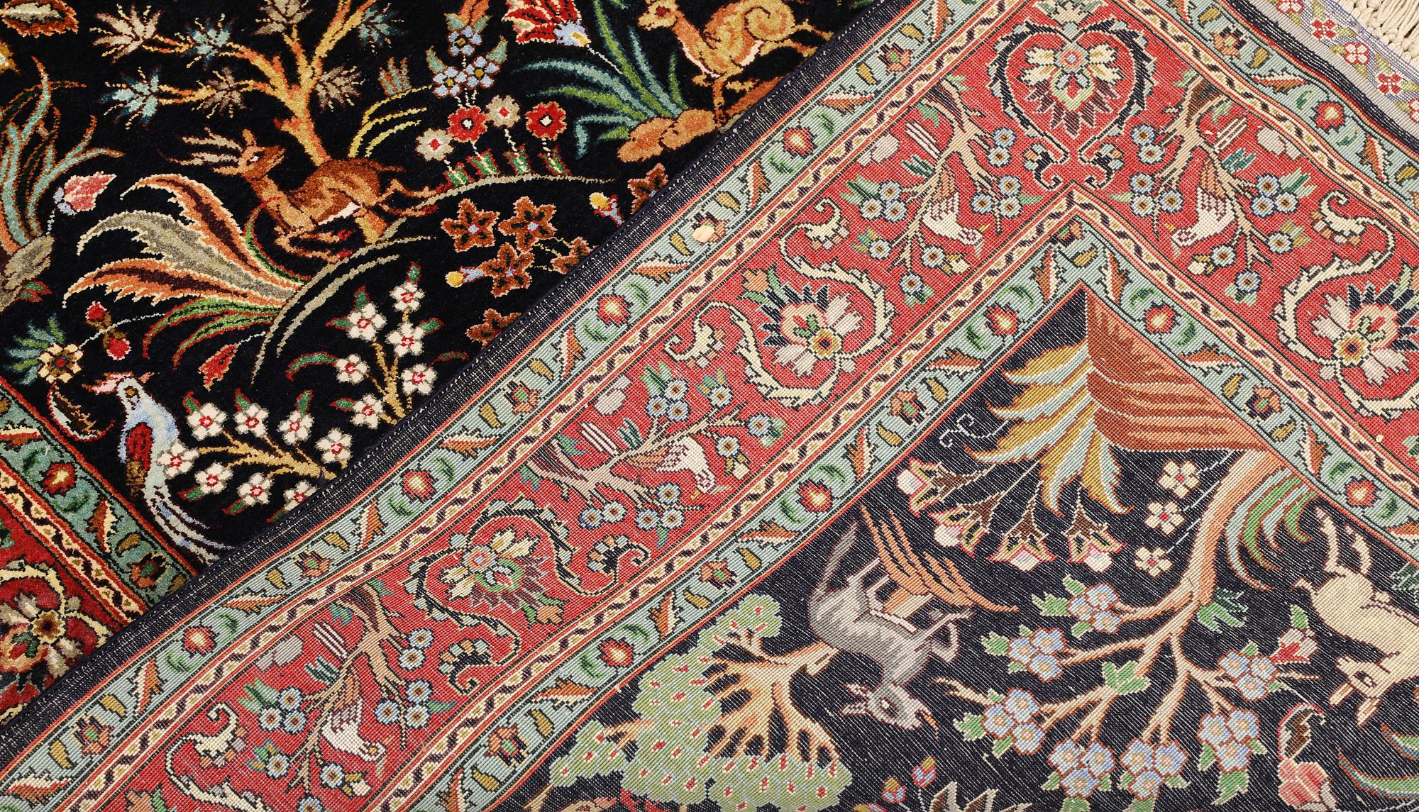 A Tabriz silk rug, approx. 155 x 100 cm.