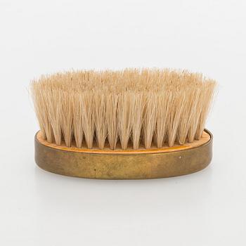 Maija Heikinheimo, A 1960s hand clothes brush for Valaistustyö for Artek, Finland.