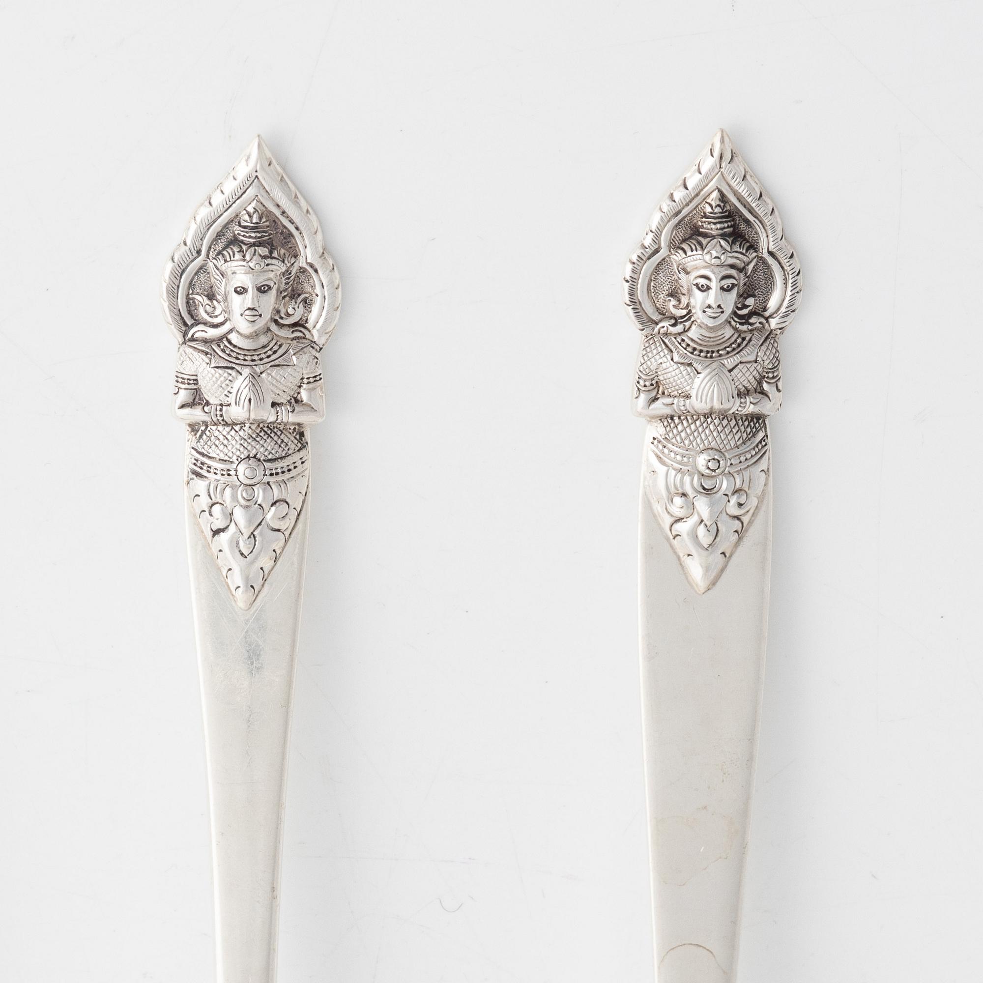 Four sterling silver servers, Thailand 20th century.