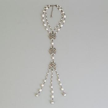 A necklace by Chanel from The Marie Antoinette Coollection 2013, runway piece.