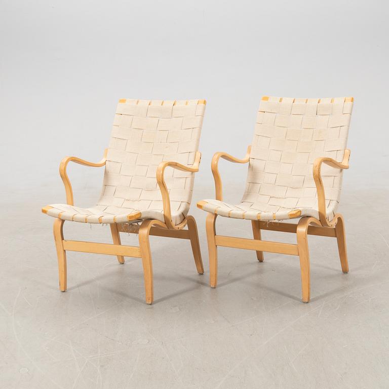 Bruno Mathsson, a pair of "Eva" armchairs for DUX, late 20th century.