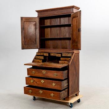 A late 18th century oak writing cabinet.