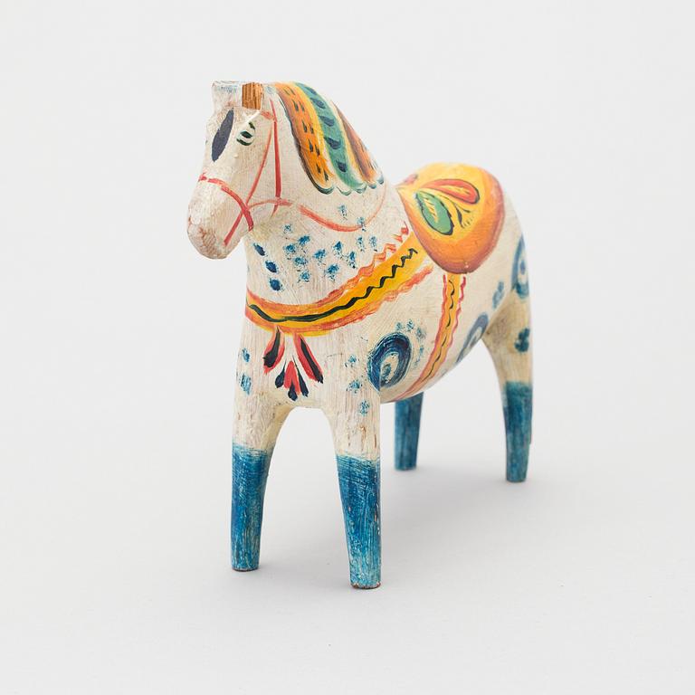 A painted folk art dala horse first half of the 20th century.