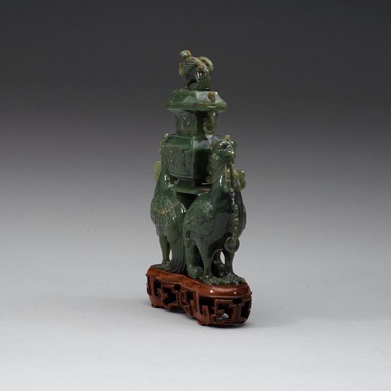 A moss green jade double fenix figurine, 20th century.