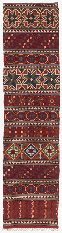 A bench cushion, flat weave, c. 262 x 64 cm, Scania, around the year 1900.