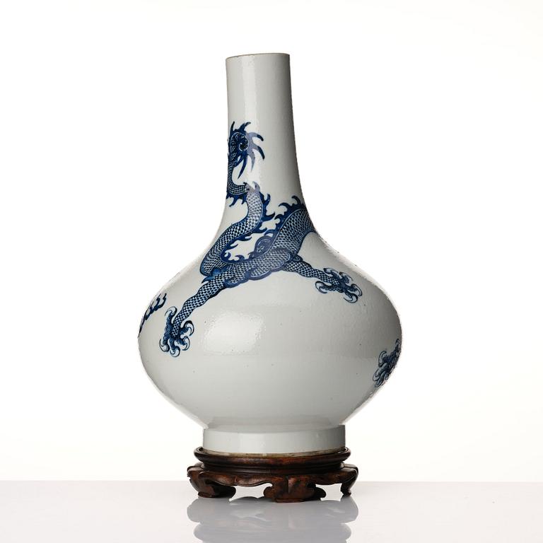 A blue and white dragon vase, Qing dynasty with Xuande six character mark.