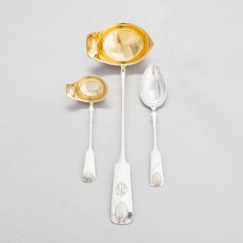 A set of six spoons, a sauce ladle and a soup ladle in silver with shell decorated handles, Finland 1912-33.