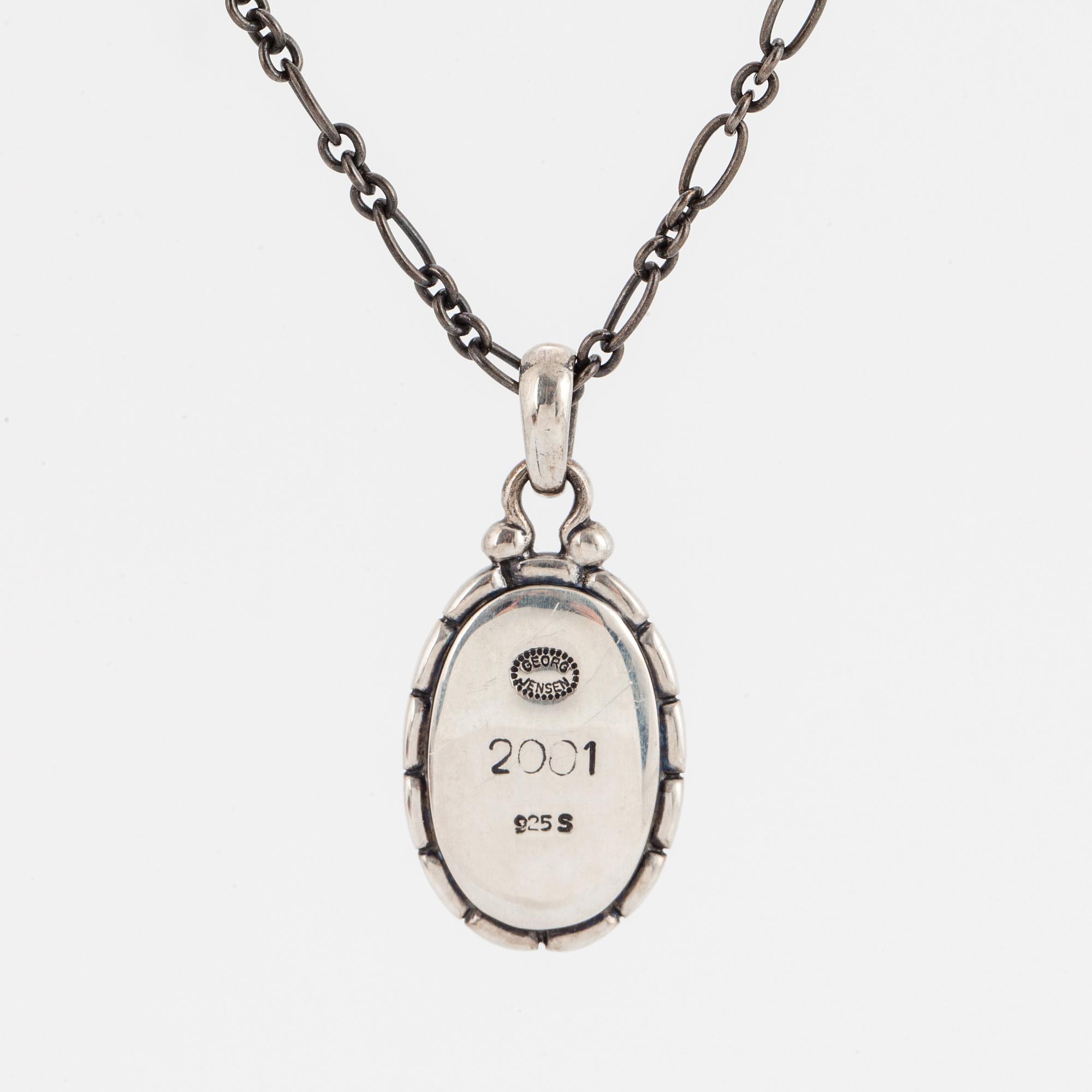 GEORG JENSEN, Pendant of the year 2001, with amber.