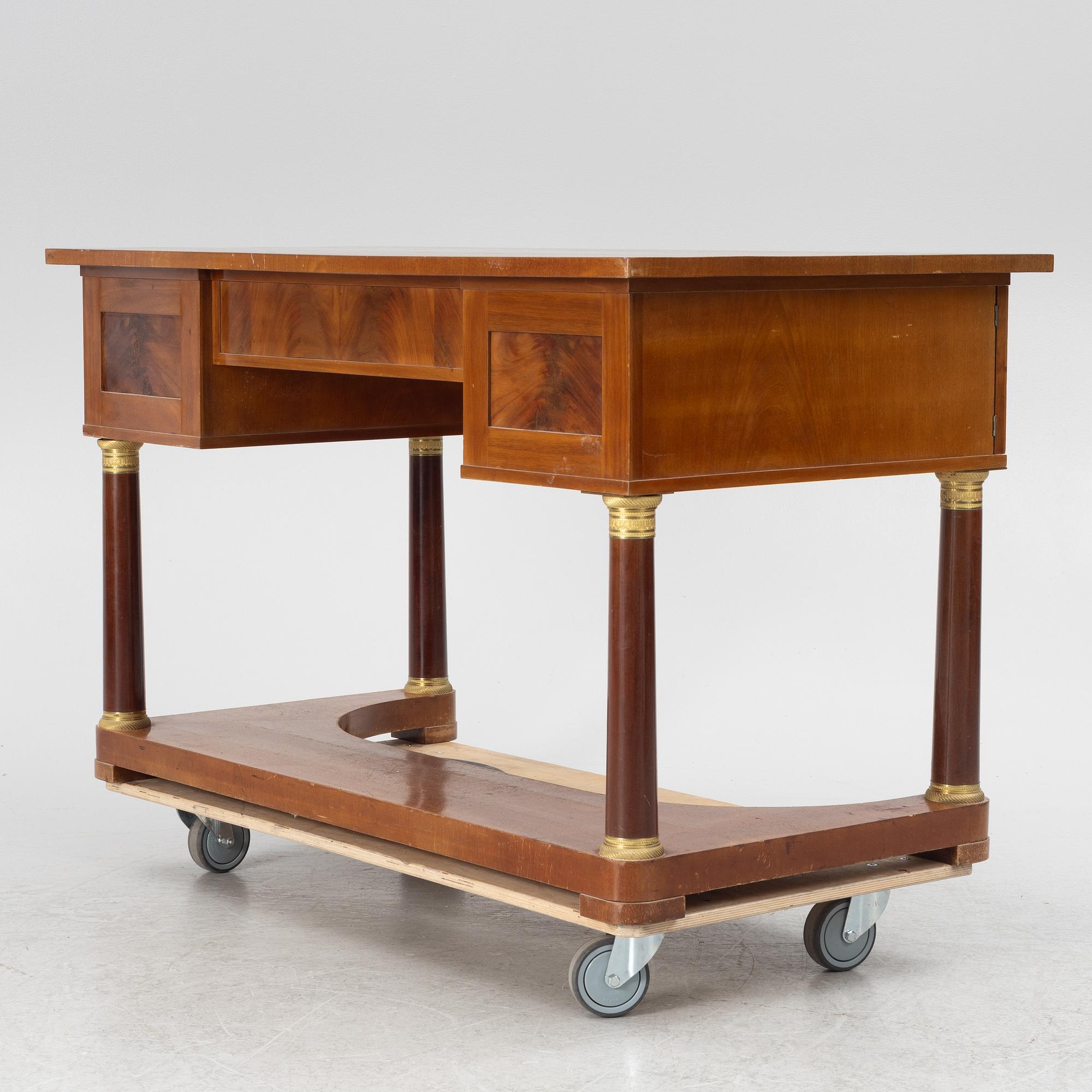 An Empire style desk, first half of the 20th Century.
