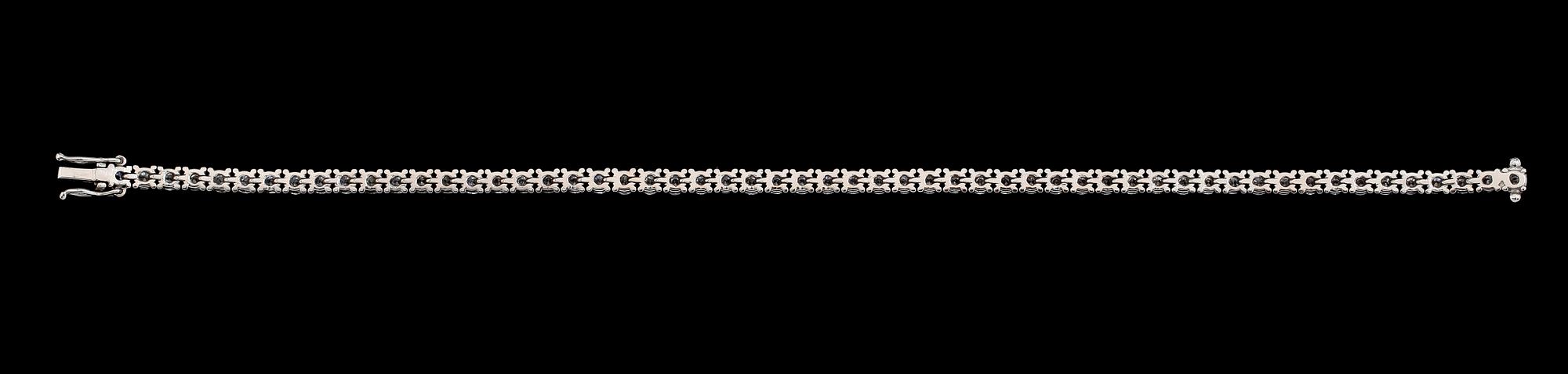 ARMBAND, 18K vitguld, Rivièrelänk, briljantslipade diamanter tot ca 4.83 ct. Vikt ca 12 g.