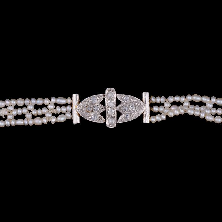 A NECKLACE, briolette cut aquamarine, rose cut diamonds, pearls, platinum.