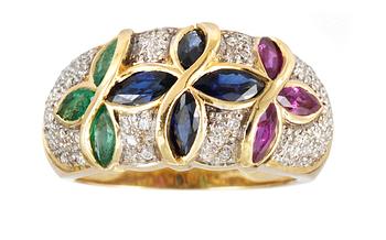 551. RING, set with rubies, sapphires, emeralds and small diamonds.