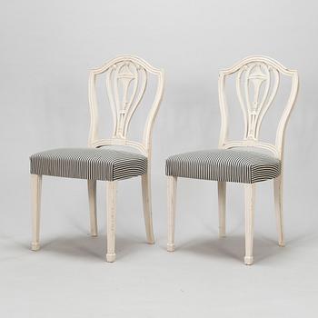 Four George III style chairs, early 20th century.