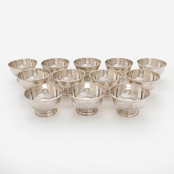 A set of 12 silver dessert bowls, Bryan Savage England 1979.