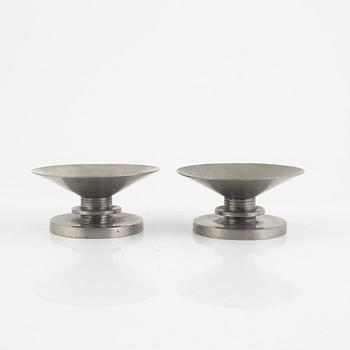 Sylvia Stave, a pair of pewter candlesticks, mark of CG Hallberg 1933.