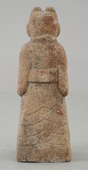 A stone sculpture of a guardian, presumably Han dynasty.