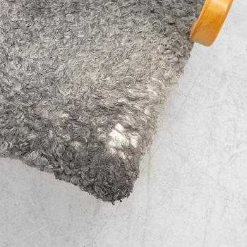 Bruno Mathsson, a 'Miranda' armchair and ottoman, Bruno Mathsson International, Värnamo, 2001.