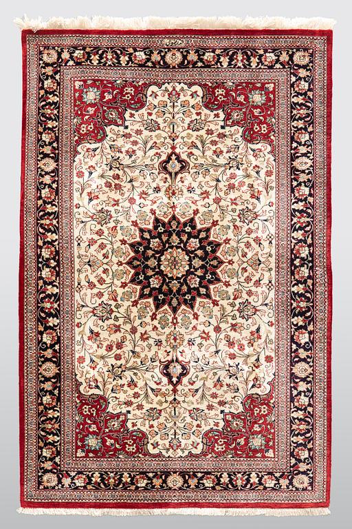 A carpet, Silk Qum, ca 116 x 75 cm.