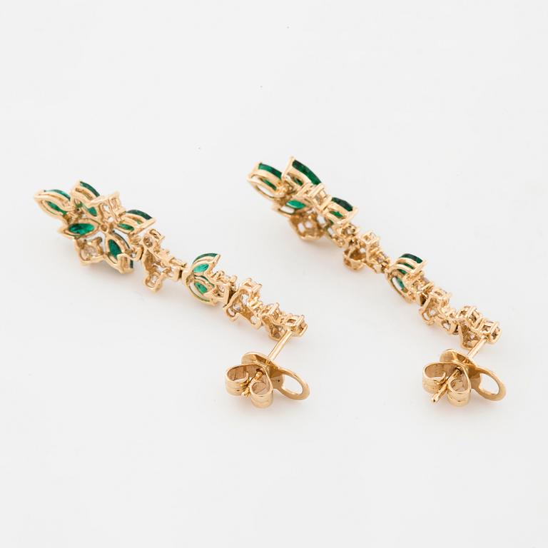 A pair of emerald and brilliant cut diamond earrings.