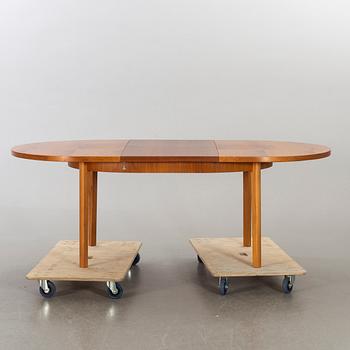 A second half of the 20th century walnut dining table.
