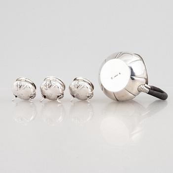 A Danish silver jug and three salt cellars, first half of the 10th Century.