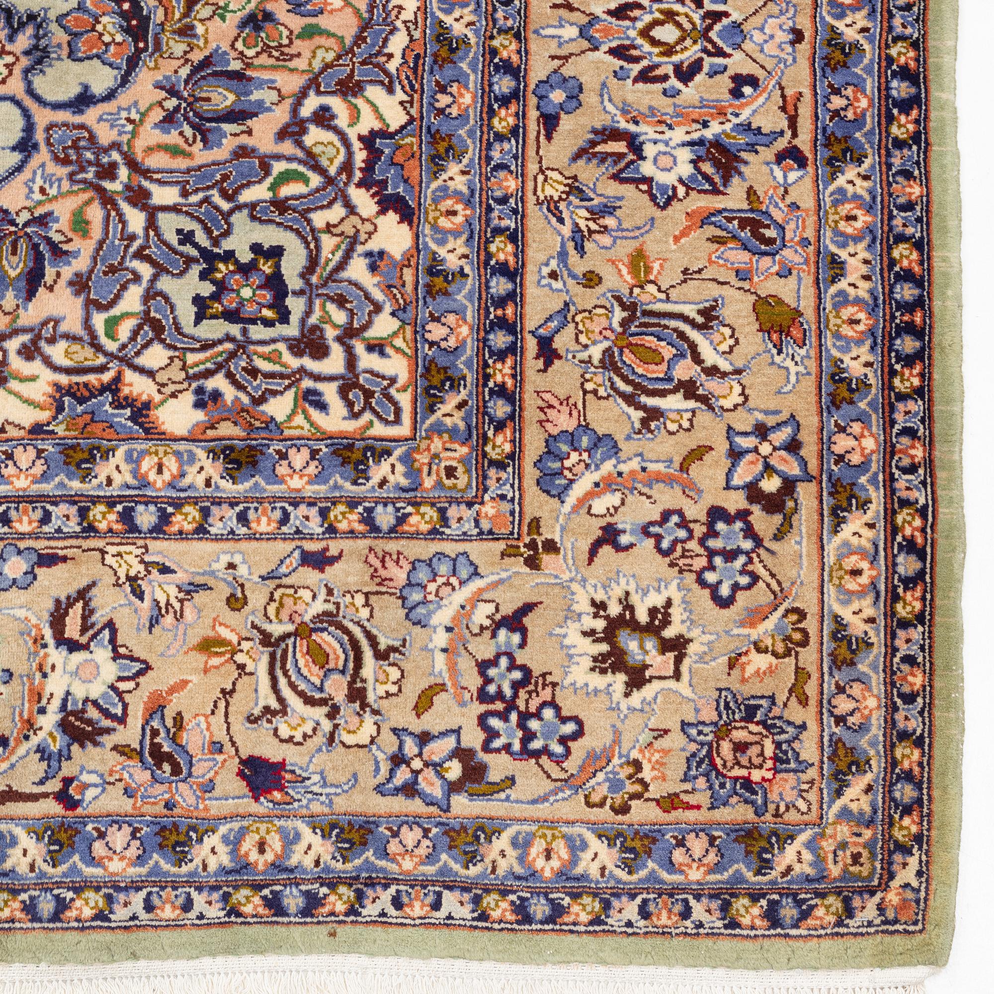 A Keshan carpet, c. 393 x 290 cm.