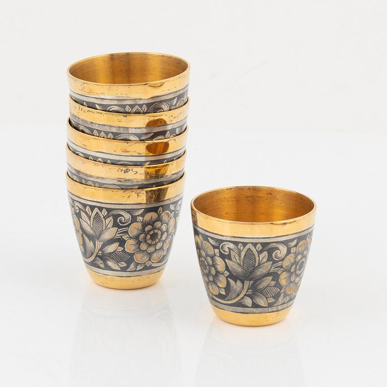 6 Russian 20th century silver beakers with niello, a small tray and two miniature enamel dishes.