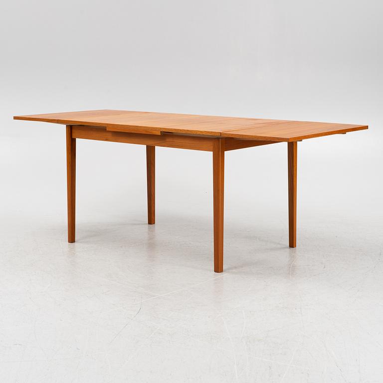 A teak dining table 1960s.